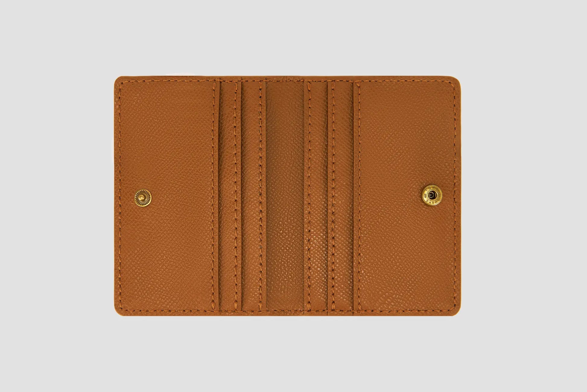 Inside view of tan wallet with card slots and smooth lining.