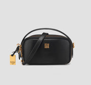Luxury black leather shoulder bag with gold hardware and logo – stylish small handbag for women  in American.