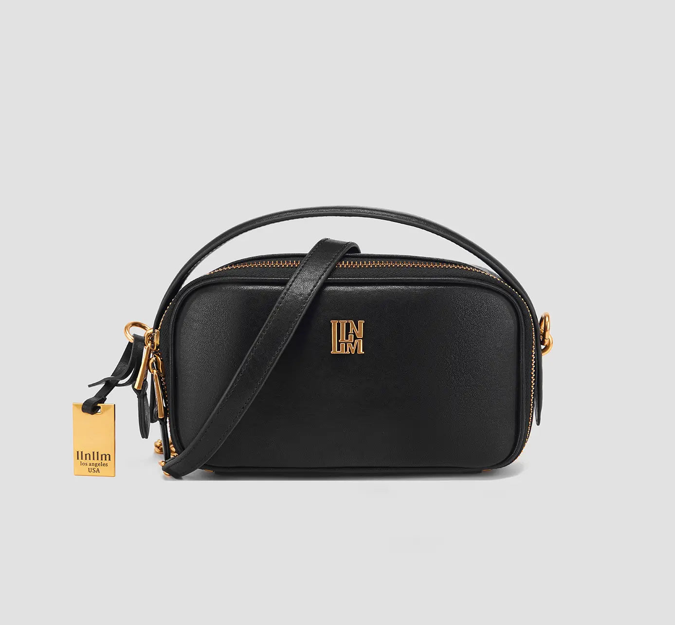 Luxury black leather shoulder bag with gold hardware and logo – stylish small handbag for women  in American.