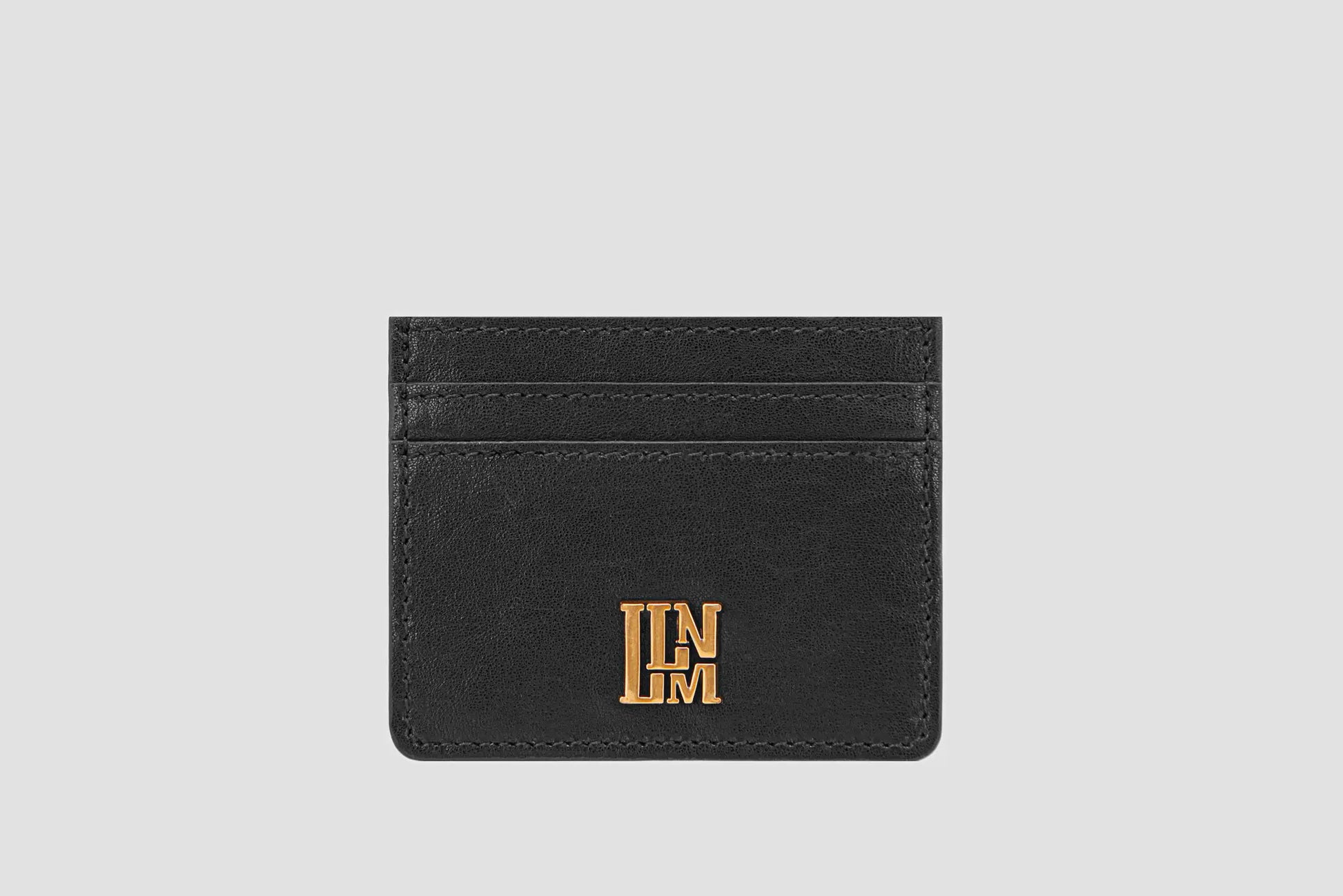 Black leather LLNLLM slim card holder with gold logo, minimalist design