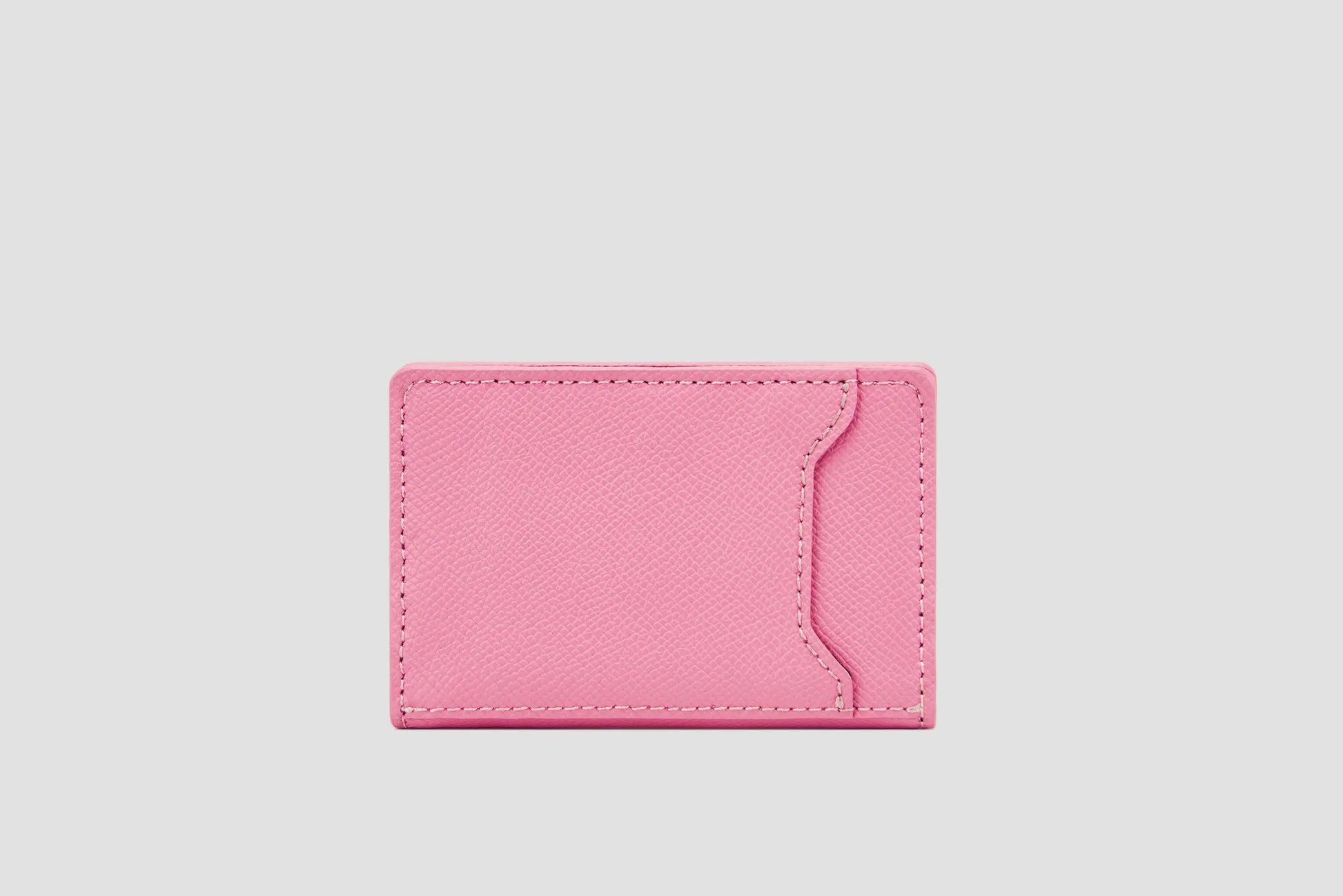 Back view of pink  wallet with slim pocket design.