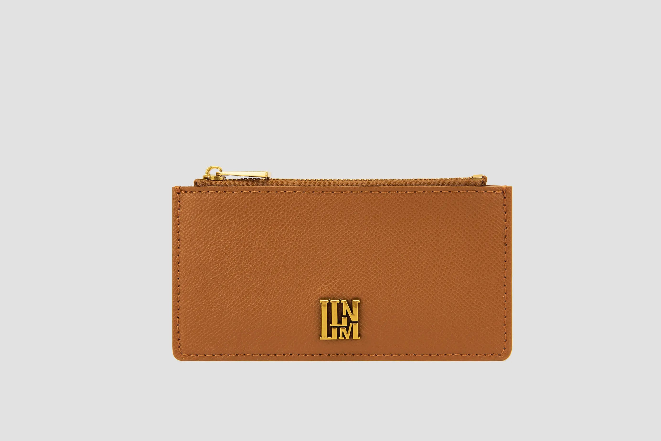Tan textured leather llnllm card holder with gold zipper and logo.