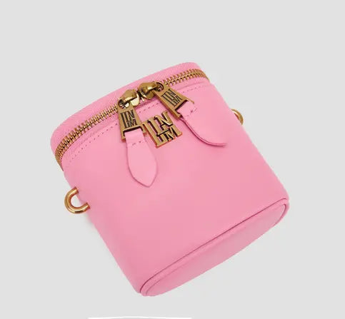 Cute pink box purse with double zippers and gold logo details, fashion crossbody bag.