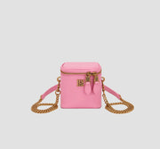 Pink mini crossbody bag with gold chain strap, box-shaped small purse for women.