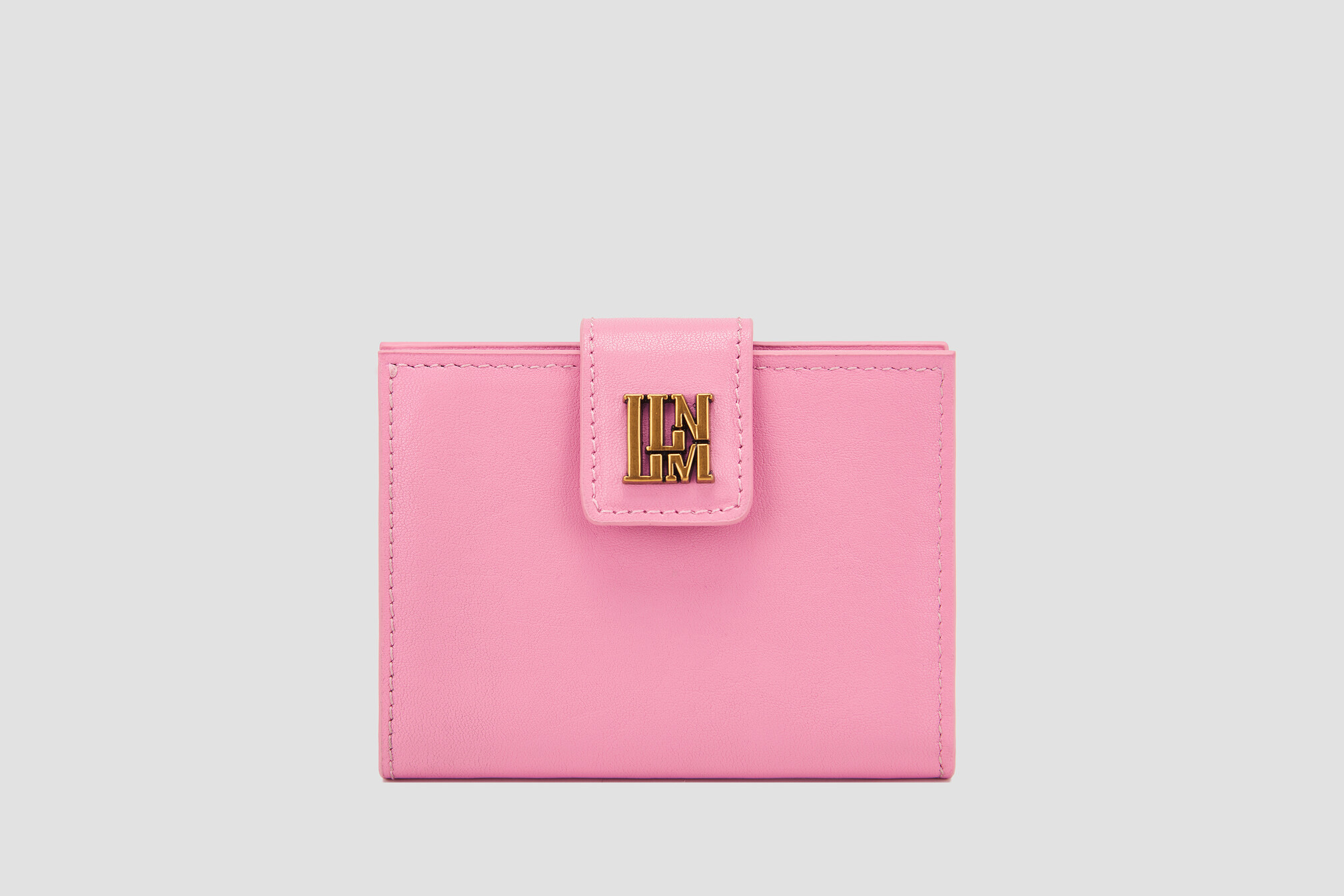 Pink leather llnllm women’s wallet with gold logo clasp, chic and playful design.