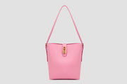 The front of an Elegant pink bucket bag with gold lock detail and adjustable shoulder strap.