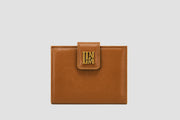 The front of brown leather llnllm women’s wallet with gold logo clasp, classic style.