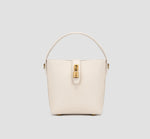 The front view of ivory white bucket bag with gold lock closure – elegant women's structured handbag for office and everyday use.