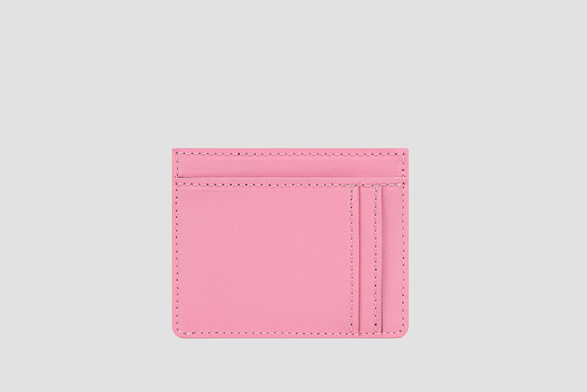 The back view of pink llnllm card holder with multiple card slots.