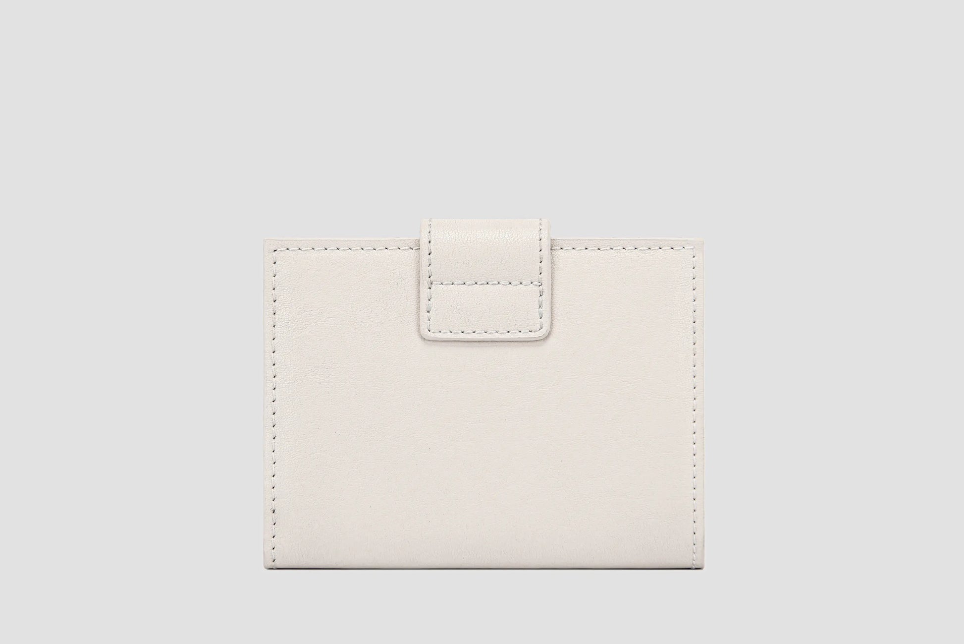The back view of white llnllm leather wallet, clean stitching and sleek design.
