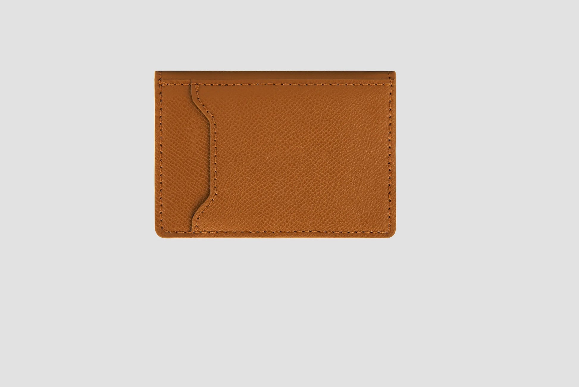 Back view of tan wallet with slim pocket detail.
