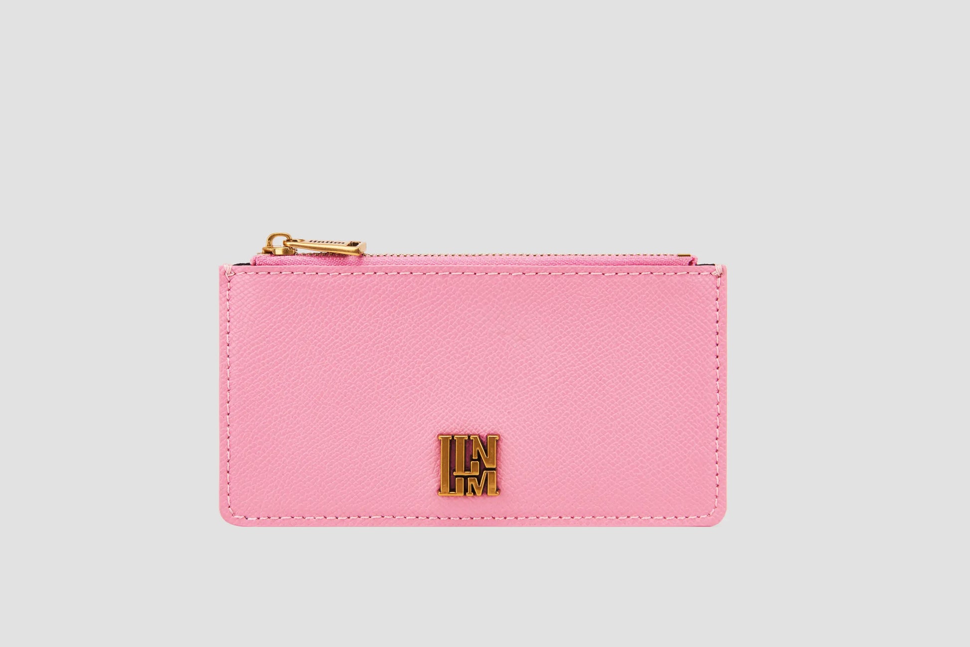 Pink textured leather llnllm card holder with gold zipper and logo.