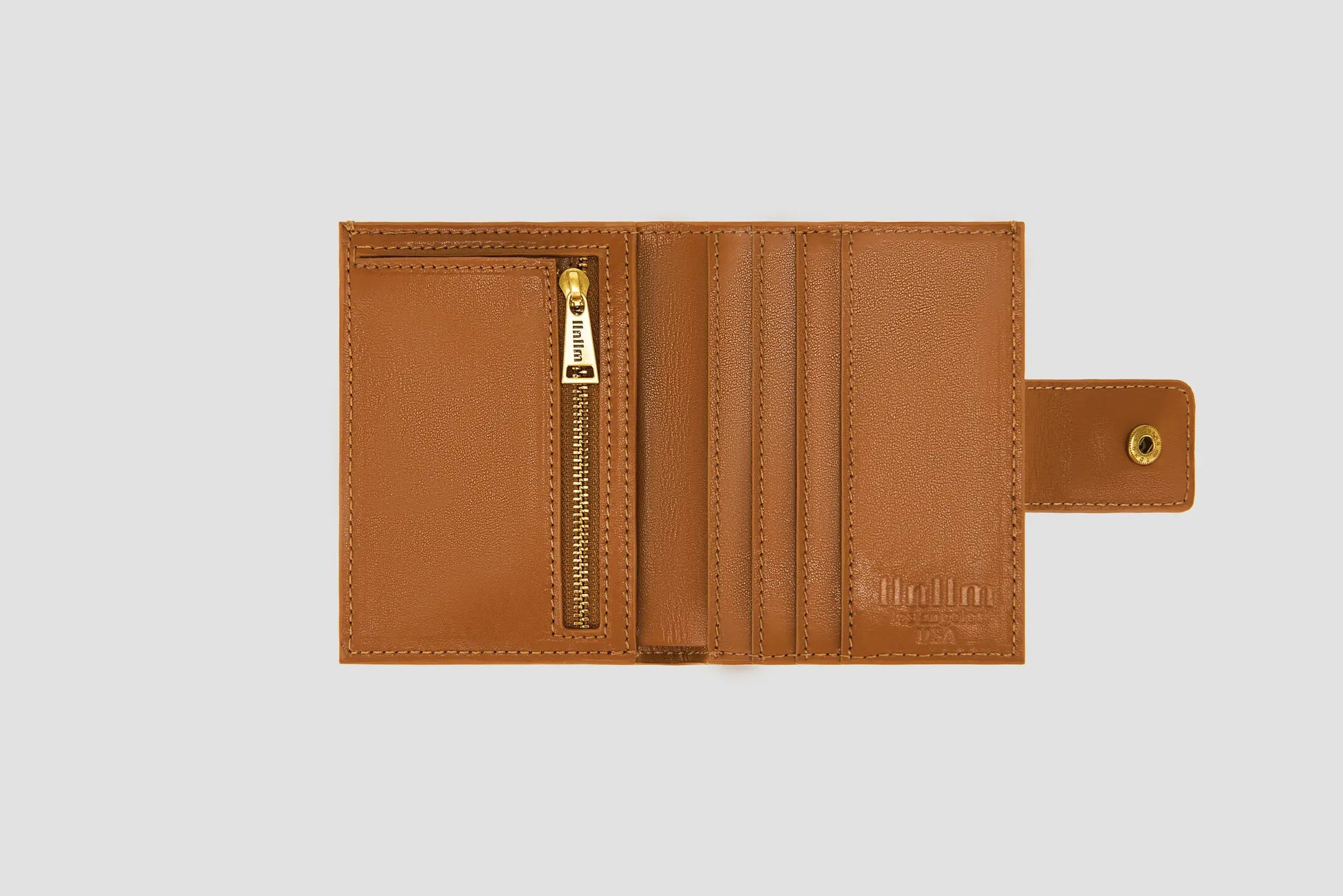 The Inside of tan llnllm wallet with card slots and gold zipper pocket.