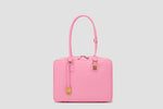 The front view of elegant structured pink leather tote bag for women with gold accents – luxury work handbag by llnllm.